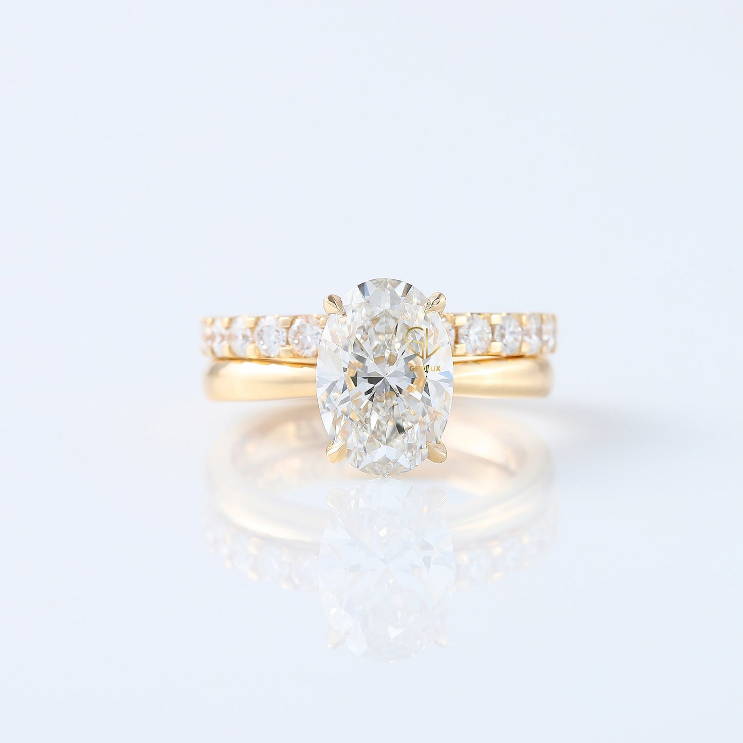 Oval Cut Moissanite Solitaire Ring With Matching Eternity Ring Set