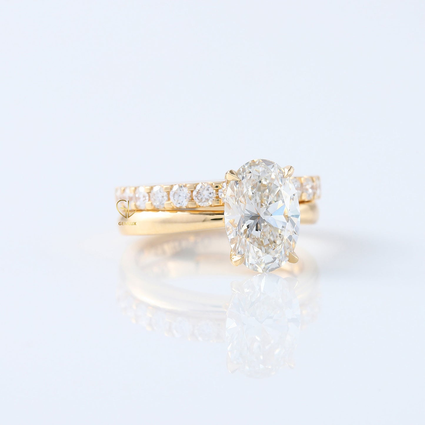 Oval Cut Moissanite Solitaire Ring With Matching Eternity Ring Set