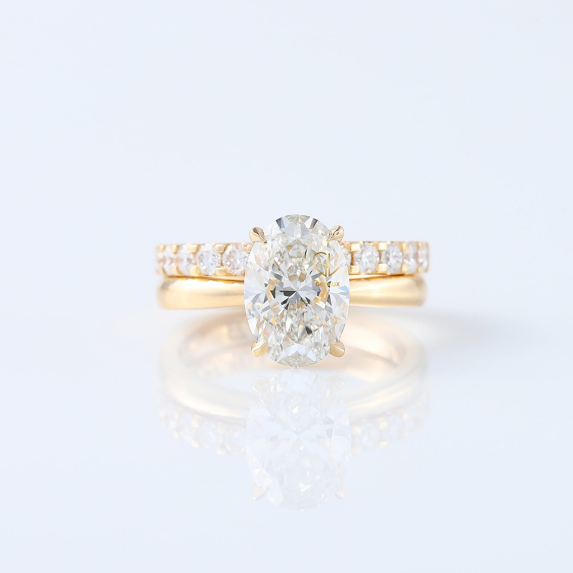 Oval Cut Moissanite Solitaire Ring With Matching Eternity Ring Set 